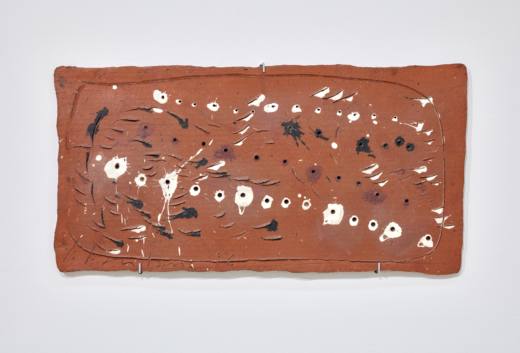 Concetto Spaziale, 1956. Painted terracotta. 36 x 72,5 cm